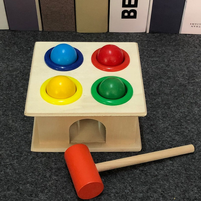 Knocking Table Knocking Ball Table Hammer Box Piling Table Teaching AiKnocking Table Knocking Ball Table Hammer Box Piling Table Teaching Aids 1-2-3 YearMain material: WoodSuitable age: 12 months or moreNumber of accessories: one hammer, four ballsPackaging size: 13 * 12 * 10cm