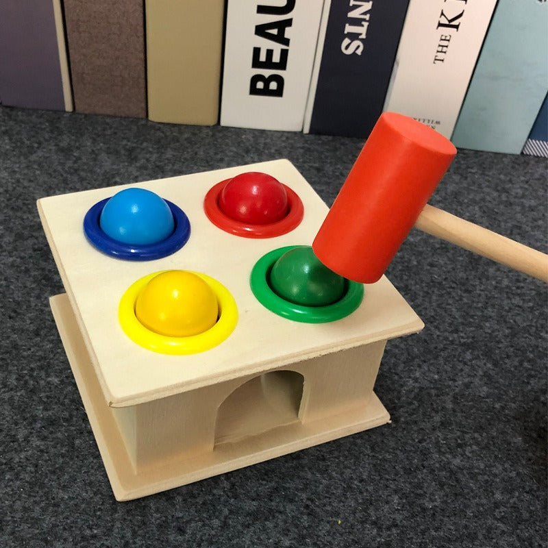 Knocking Table Knocking Ball Table Hammer Box Piling Table Teaching AiKnocking Table Knocking Ball Table Hammer Box Piling Table Teaching Aids 1-2-3 YearMain material: WoodSuitable age: 12 months or moreNumber of accessories: one hammer, four ballsPackaging size: 13 * 12 * 10cm