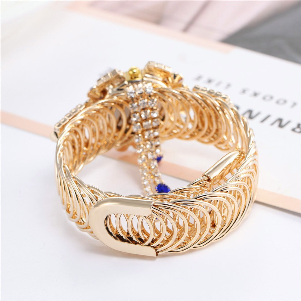 New Fashion Women's Full Diamond Alloy Fashion Watch Creative Tassel QFull Diamond Alloy Fashion Watch Creative Tassel Quartz Bracelet Watch Women'The total length of the watch buckle is approximately 19cmWatch dial diameter: approximately 3.2cmWatch mirror diameter: approximately 0.9cmWatch strap width approxi