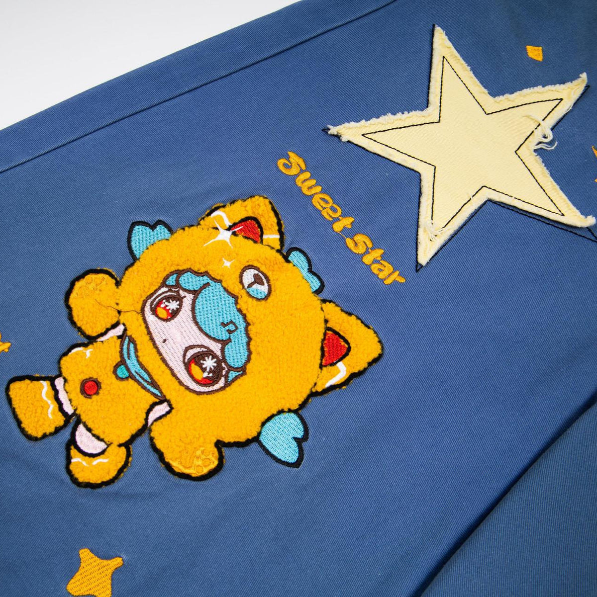 Cartoon patchwork embroidered jeans